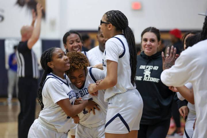 Shadow Ridge guard Zhoey Reddick, left, guard Jada Livingston and forward Jaslyn Jefferson cele ...