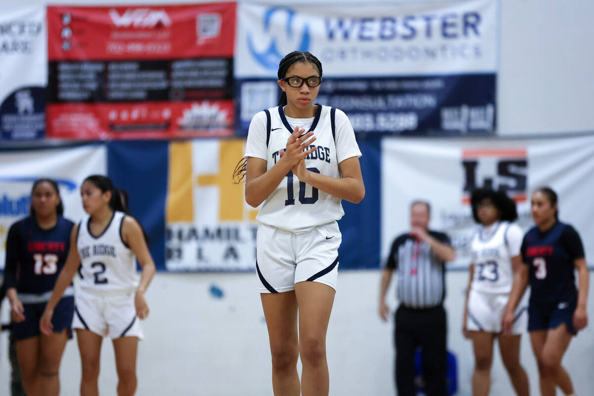 Shadow Ridge forward Jaslyn Jefferson (10) celebrates after scoring during the first half of a ...