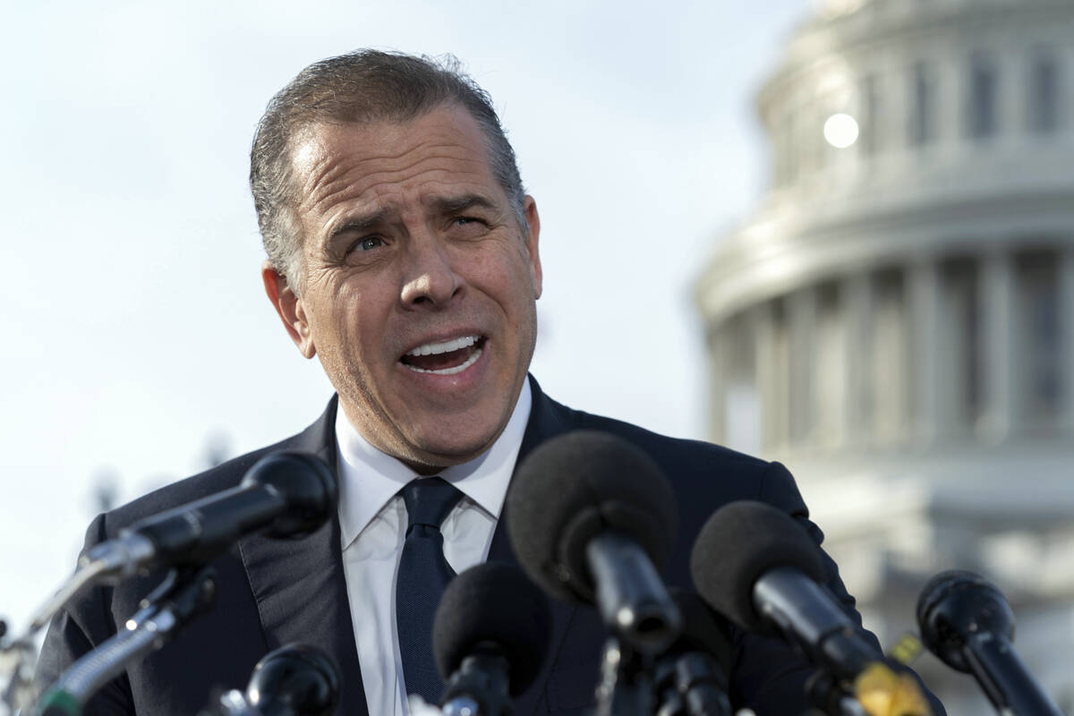 FILE - Hunter Biden, son of President Joe Biden, talks to reporters at the U.S. Capitol, in Was ...