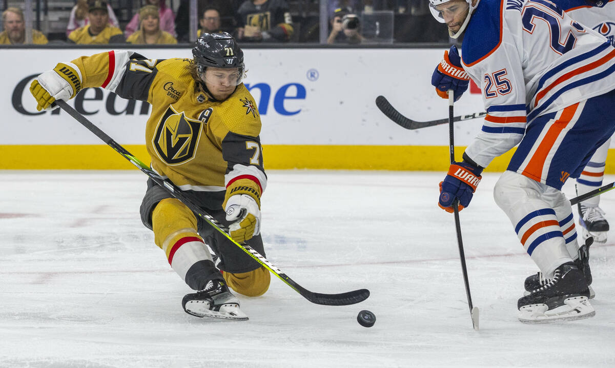 Golden Knights center William Karlsson (71) looks to shoot as Edmonton Oilers defenseman Darnel ...