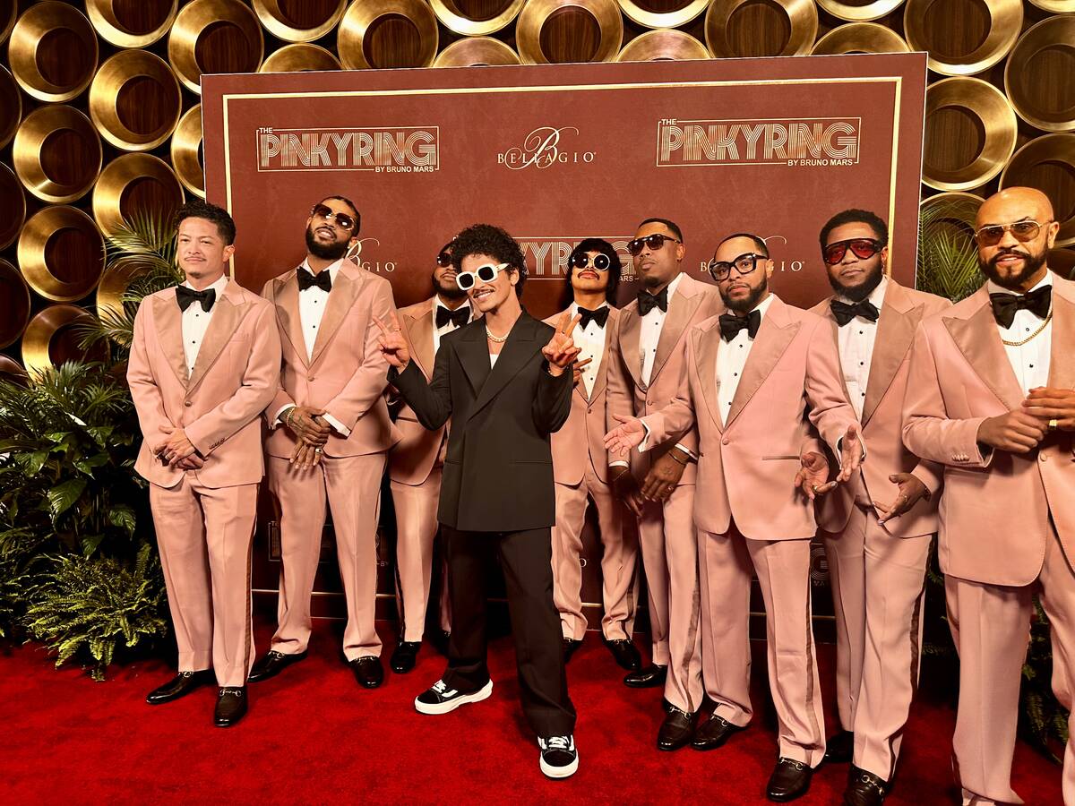 Bruno Mars and the Hooligans are shown at the VIP opening of The Pinky Ring at Bellagio on Satu ...