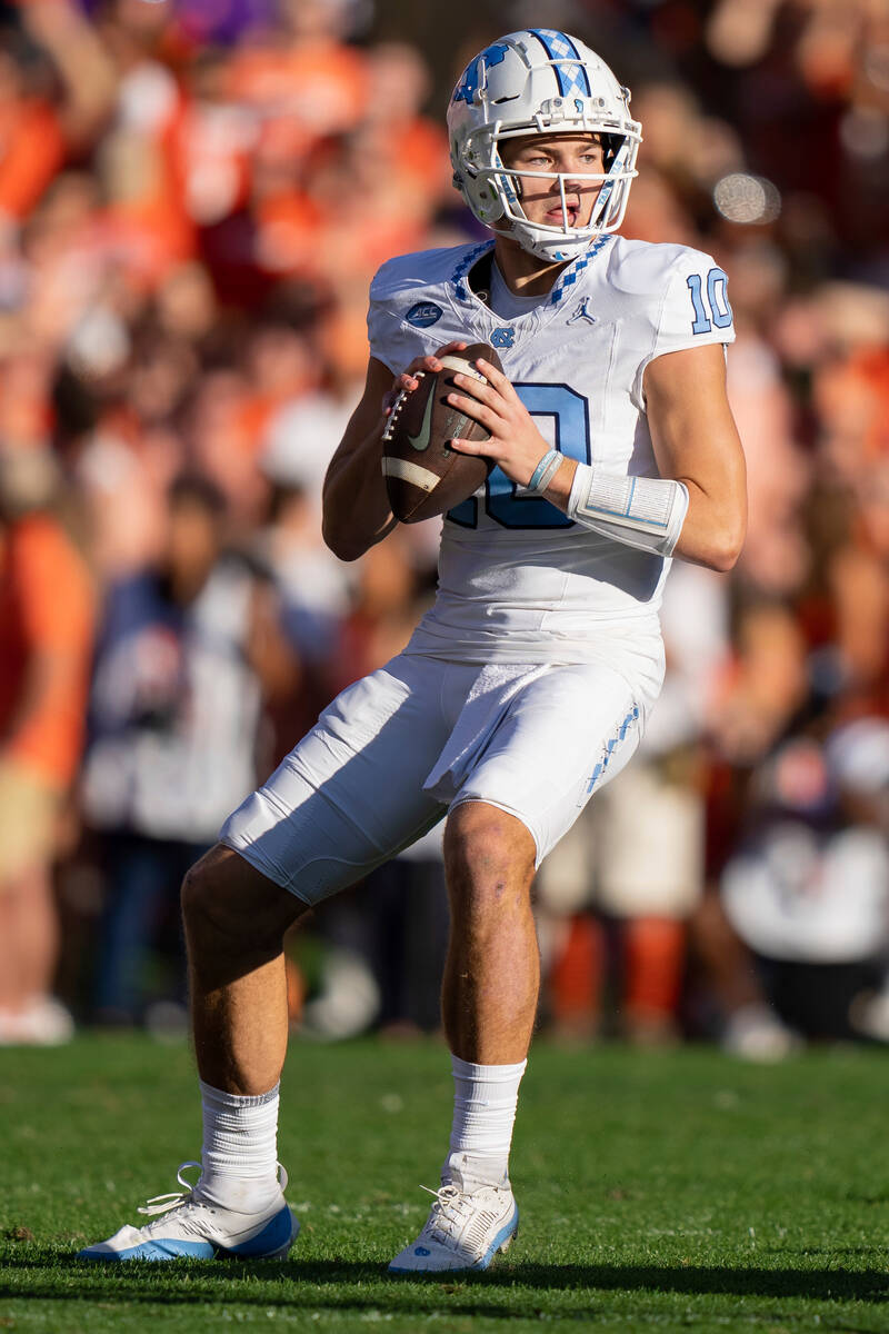 North Carolina quarterback Drake Maye (10) looks to pass against Clemson during an NCAA college ...