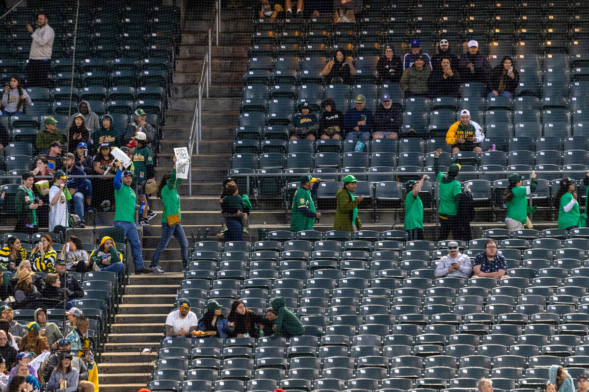 The Oakland A's fans protest at the Oakland Coliseum during a baseball game between the A&#x201 ...