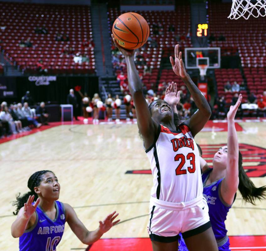 UNLV Lady Rebels center Desi-Rae Young (23) elevates for a shot as Air Force Falcons guard Jayd ...