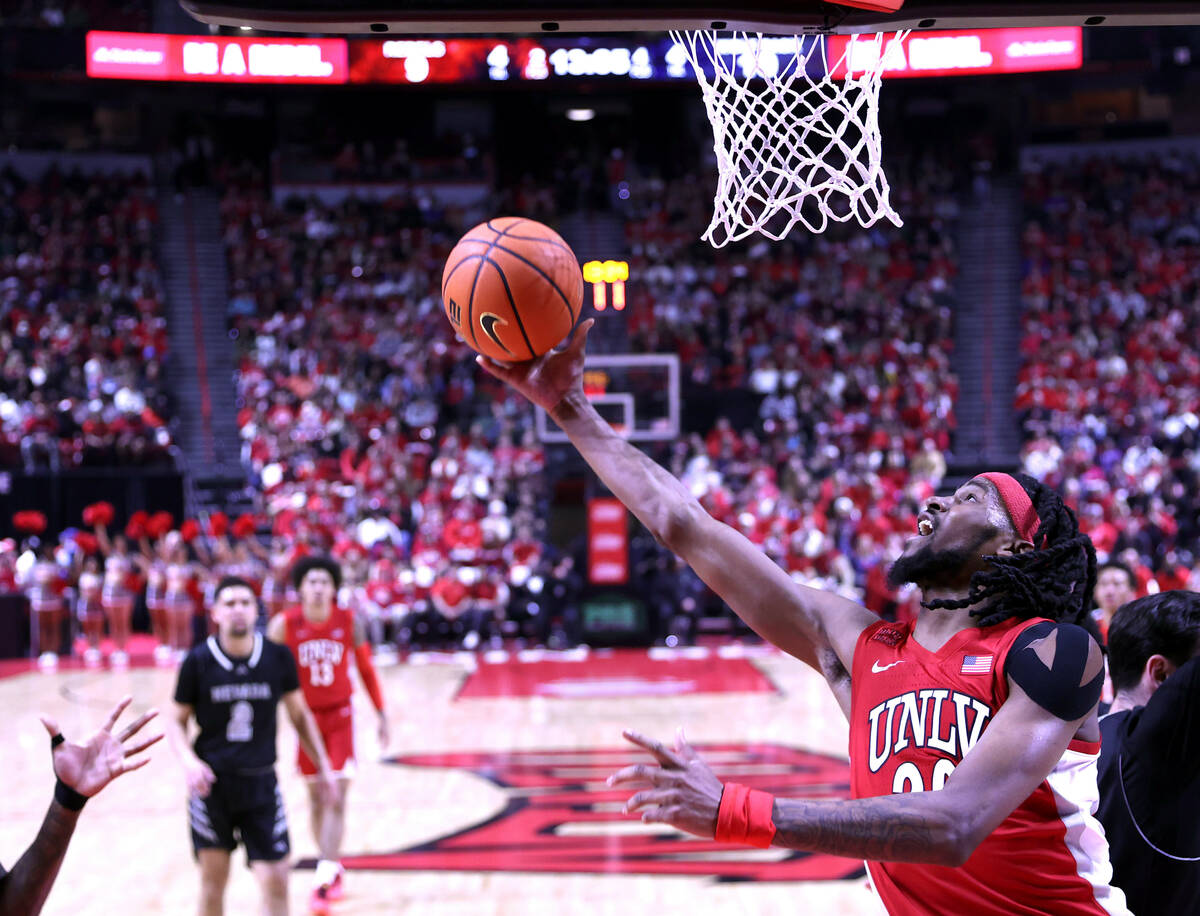 UNLV Rebels forward Keylan Boone (20) gets inside of UNR for a basket during the first half of ...