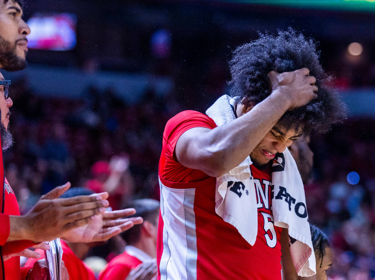UNLV Rebels forward Rob Whaley Jr. (5) pounds his head as the game tightens against UNR during ...
