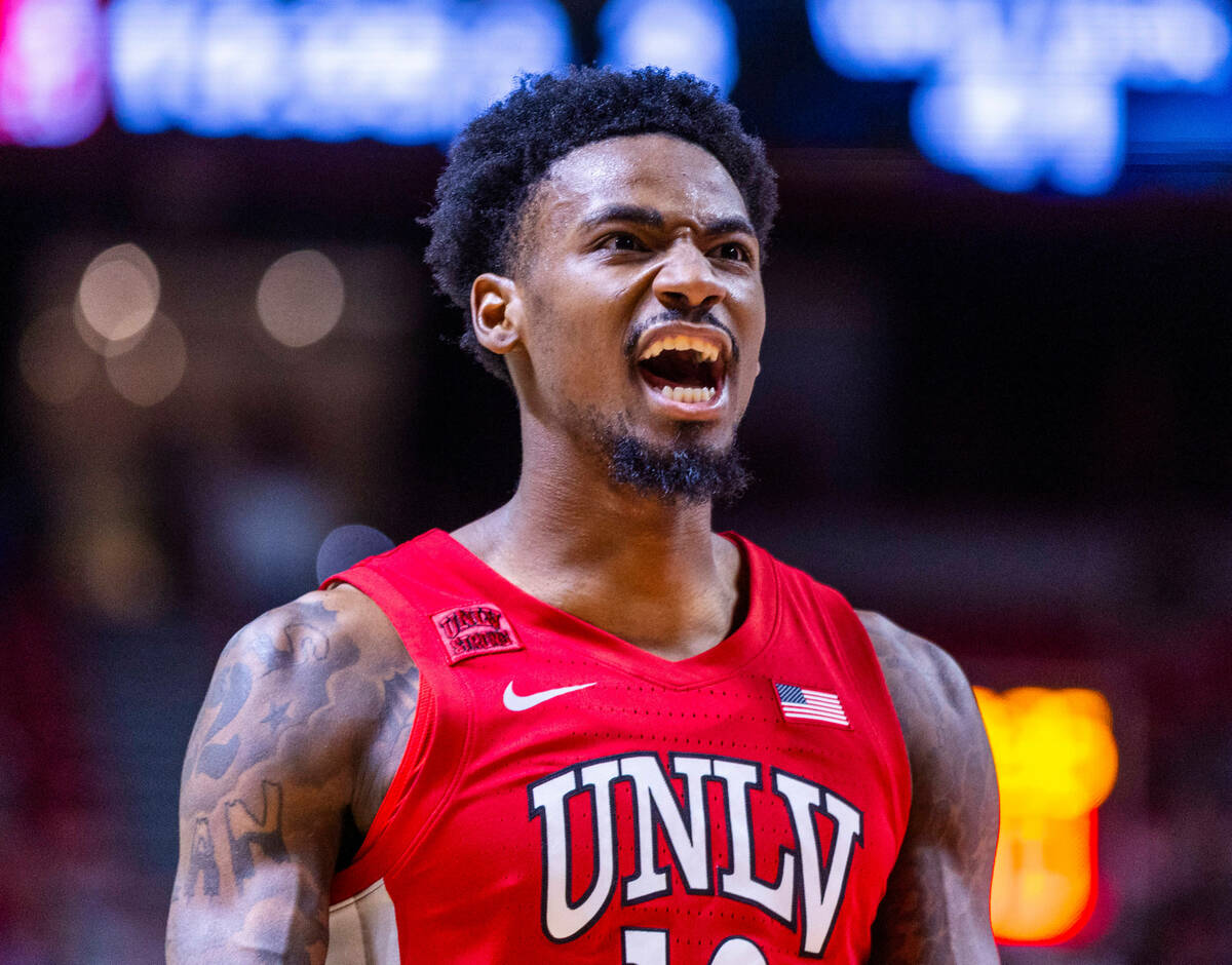 UNLV Rebels forward Kalib Boone (10) yells as things gets tight against UNR during the second h ...