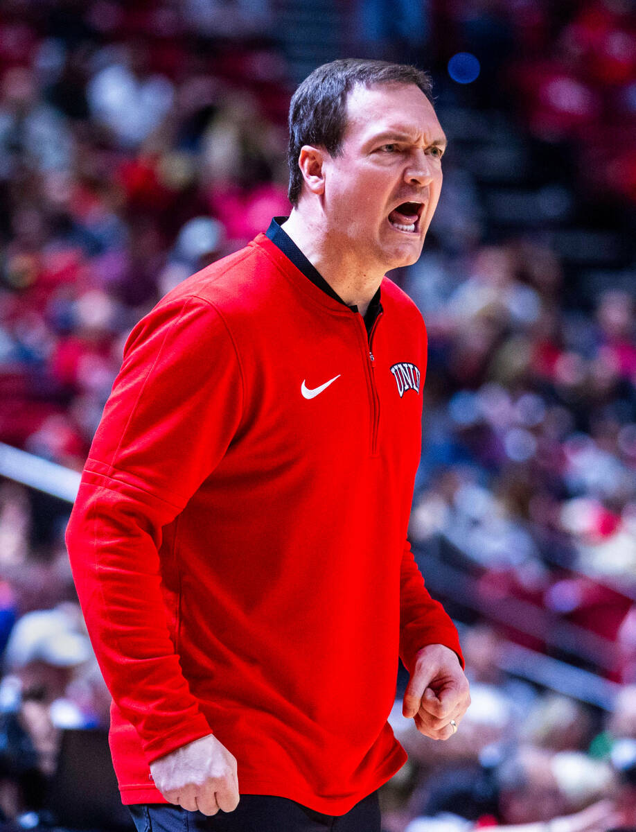 UNLV Rebels head coach Kevin Kruger yells to his players against UNR during the second half of ...