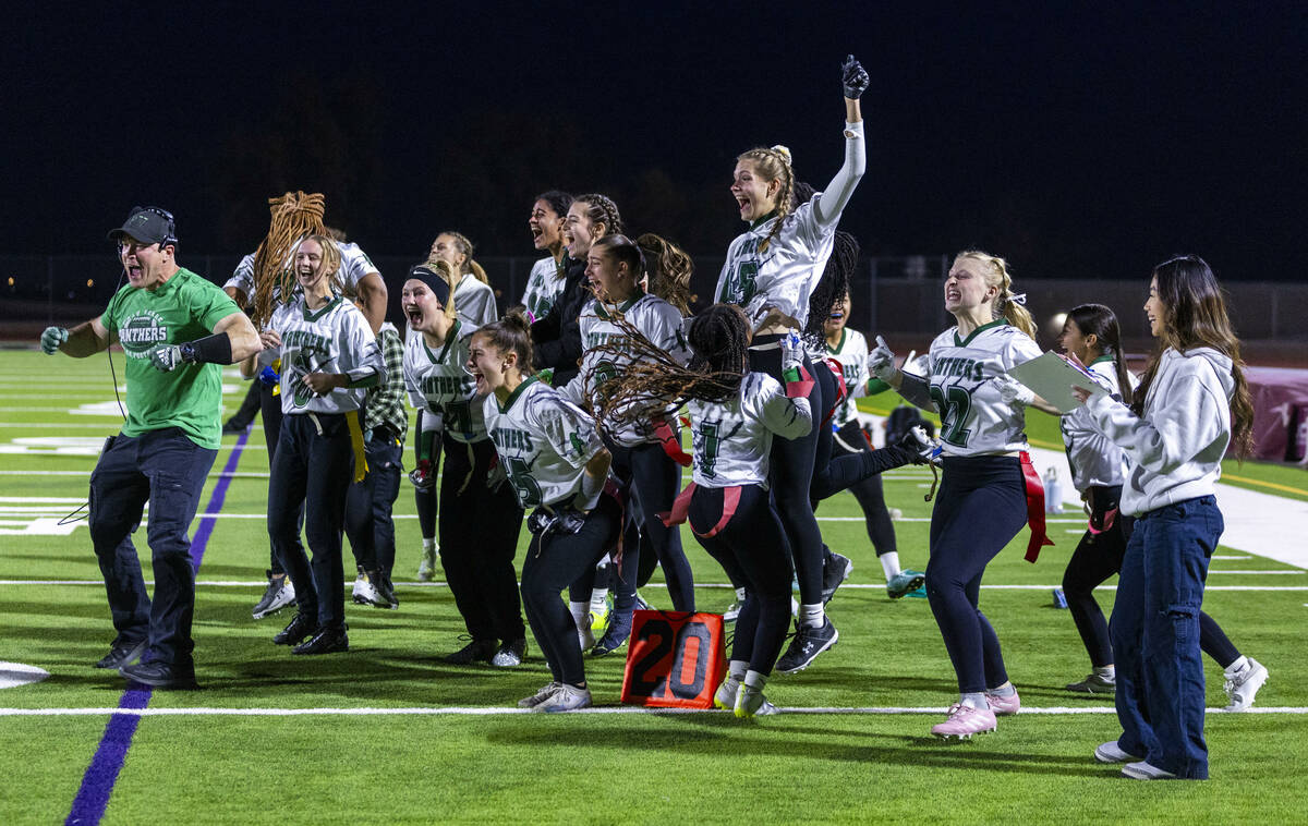 Palo Verde players celebrate a touchdown over Desert Oasis during the first half of their Class ...