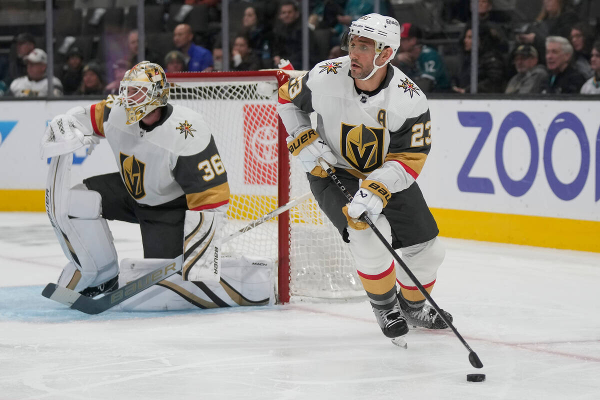 Vegas Golden Knights defenseman Alec Martinez (23) skates with the puck against the San Jose Sh ...