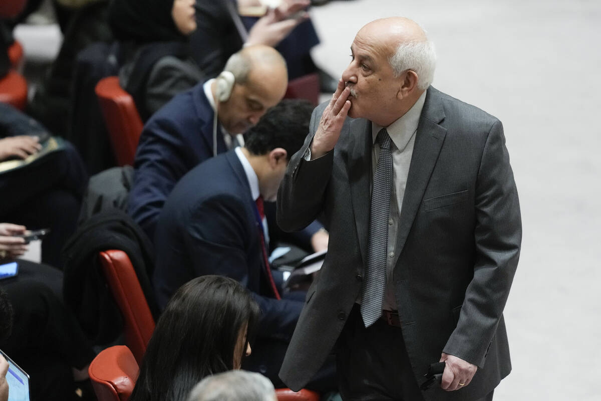 Riyad Mansour, Palestinian Ambassador to the United Nations, blows a kiss to someone before the ...