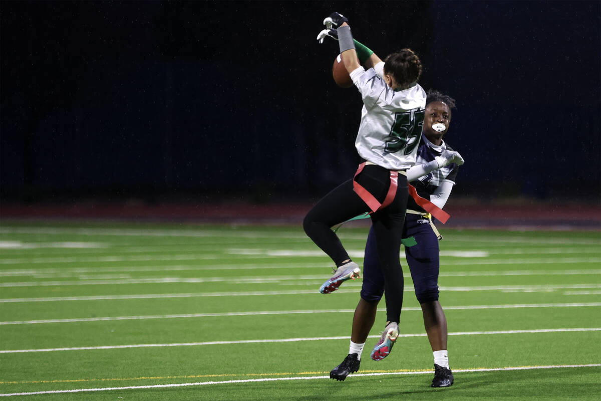 Palo Verde's Arden Petkewich (55) denies Shadow Ridge's Kyliah Rivera-Kyle’s pass during ...