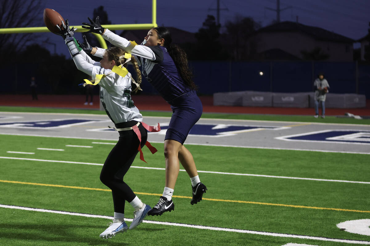 Palo Verde's Samantha Manzo (26) attempts an interception against Shadow Ridge's Jaylani Palmer ...