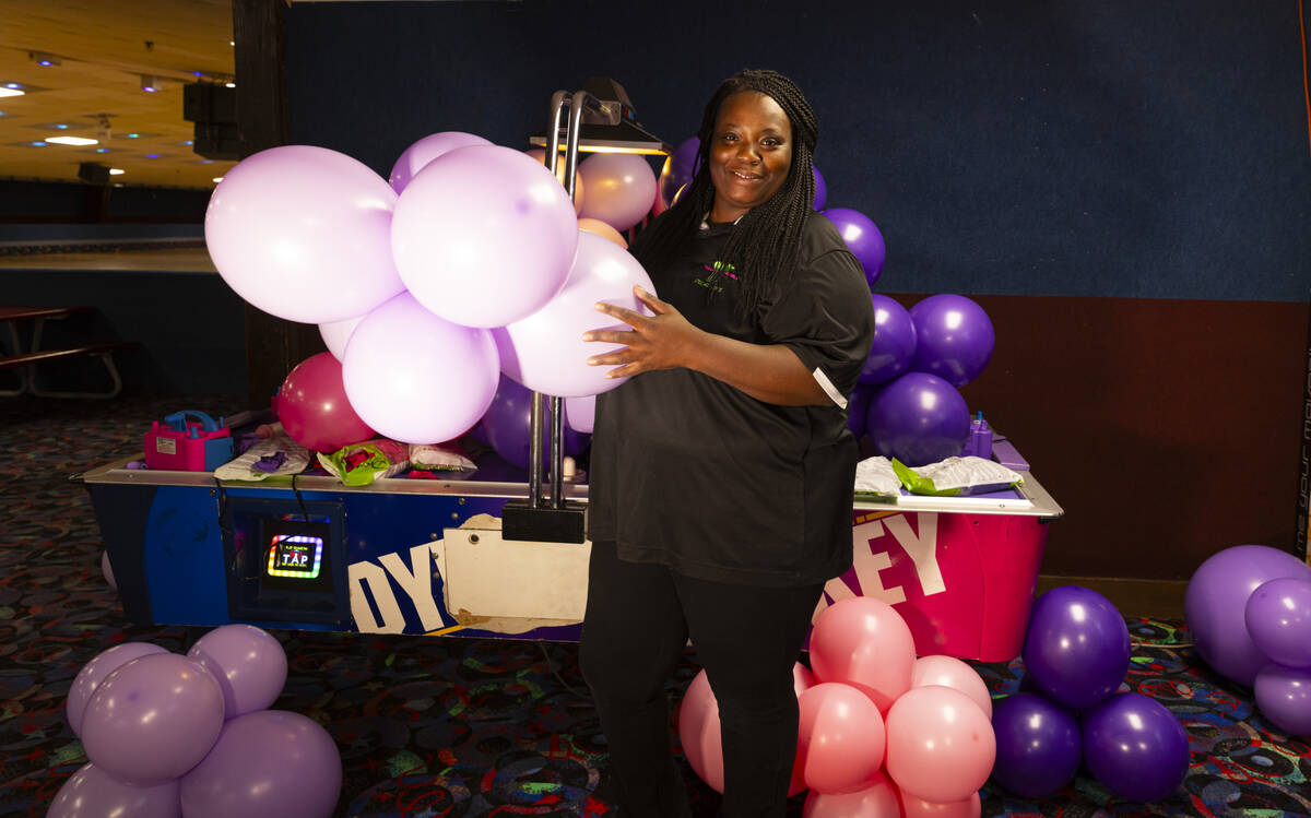 Las Vegas entrepreneur Jessica Washington, who owns Las Vegas Balloons, poses for a portrait wh ...