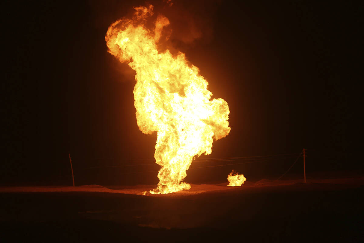 Flames leap into the air after a natural gas pipeline explodes outside the city of Boroujen in ...