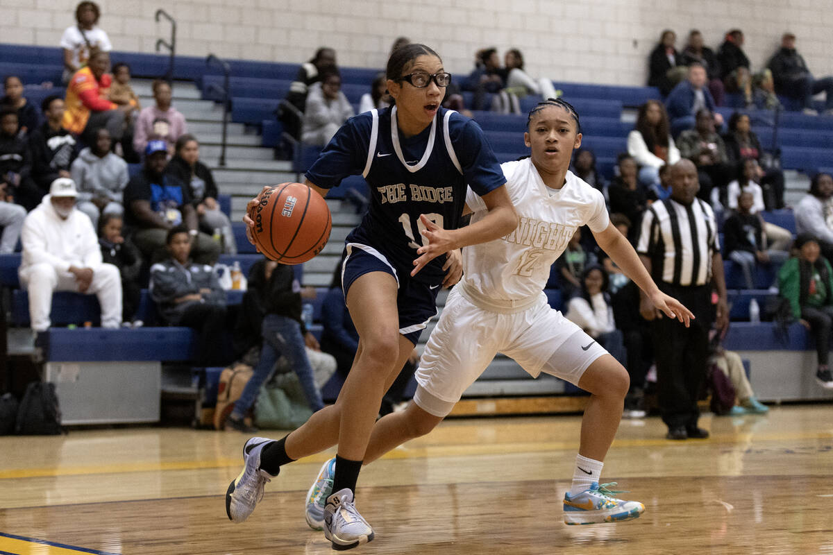 Shadow Ridge’s Jaslyn Jefferson (10) drives toward the hoop against Democracy Prep&#x201 ...