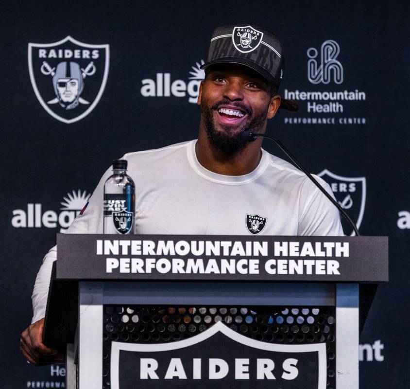 Raiders running back Ameer Abdullah (22) enjoys a question in a media interview during training ...