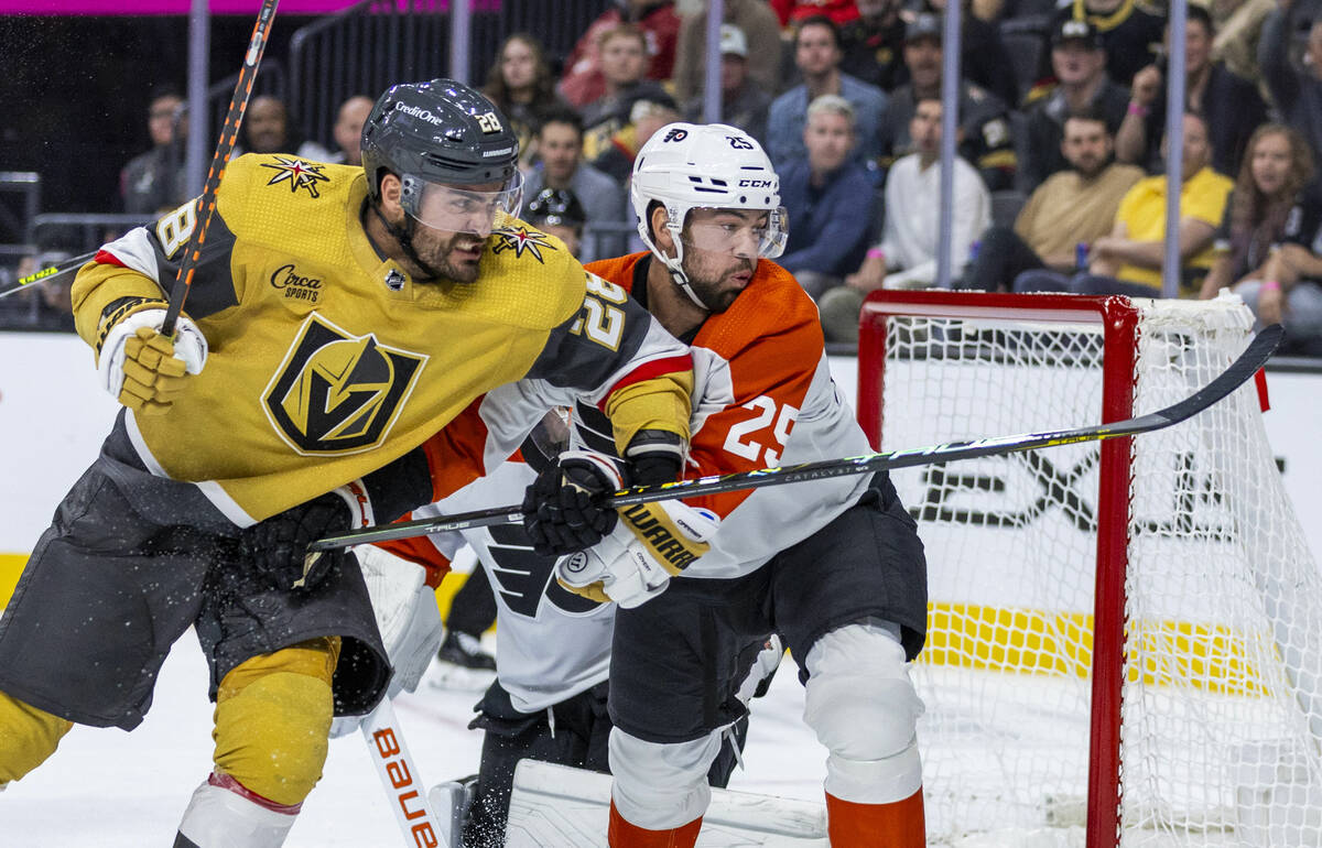 Golden Knights left wing William Carrier (28) battles for position against Philadelphia Flyers ...