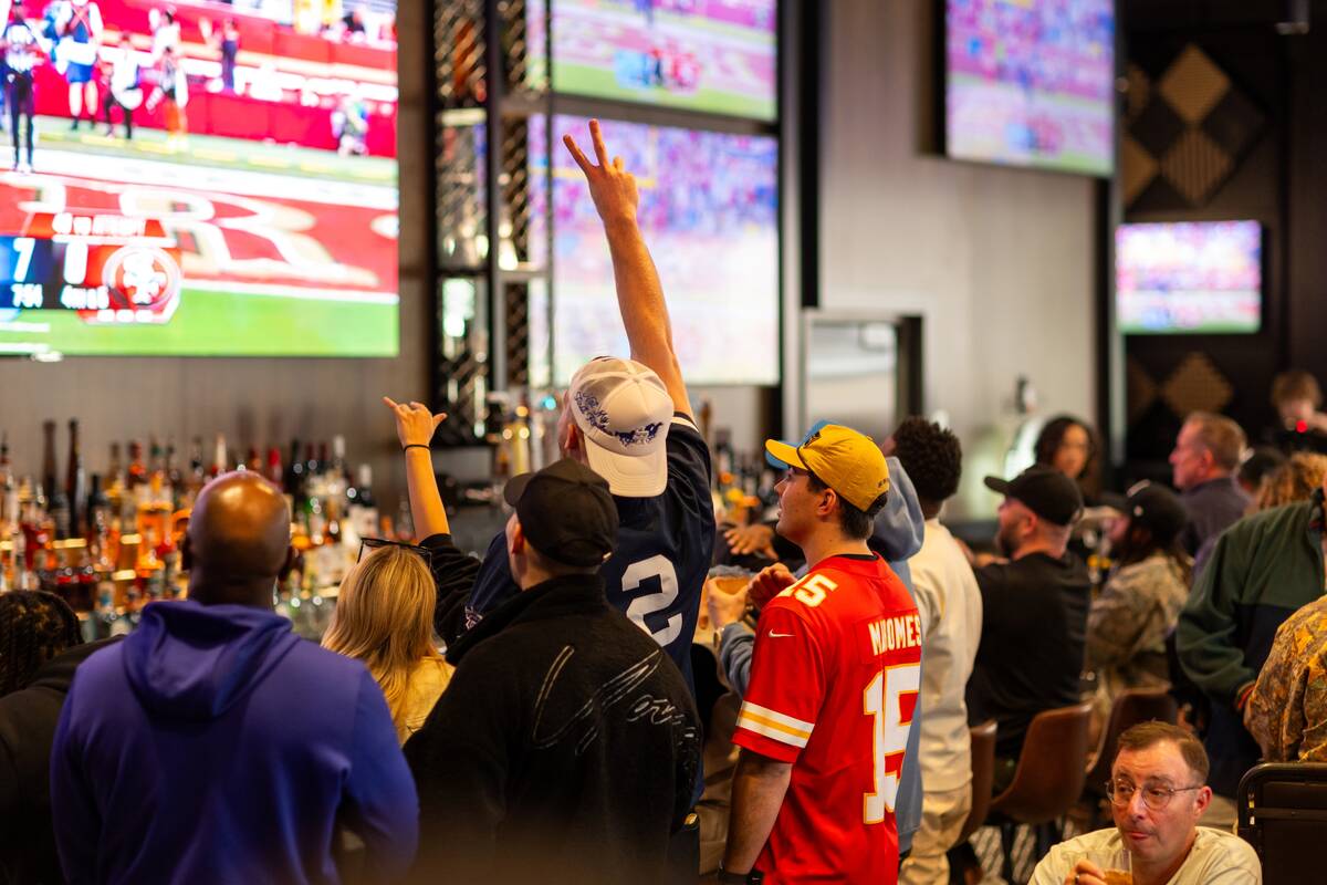 Football fans at General Admission sports bar in the UnCommons development in southwest Las Veg ...