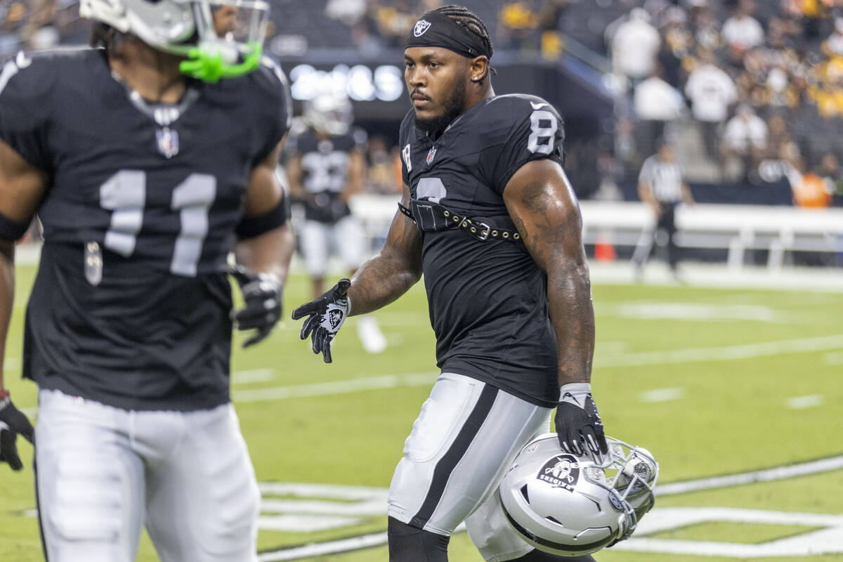 Raiders running back Josh Jacobs (8) walks on the field before an NFL game against the Pittsbur ...