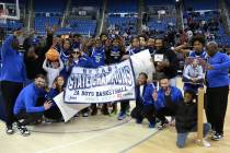 The Democracy Prep Blue Knights celebrate after winning the Class 3A boys basketball state cham ...