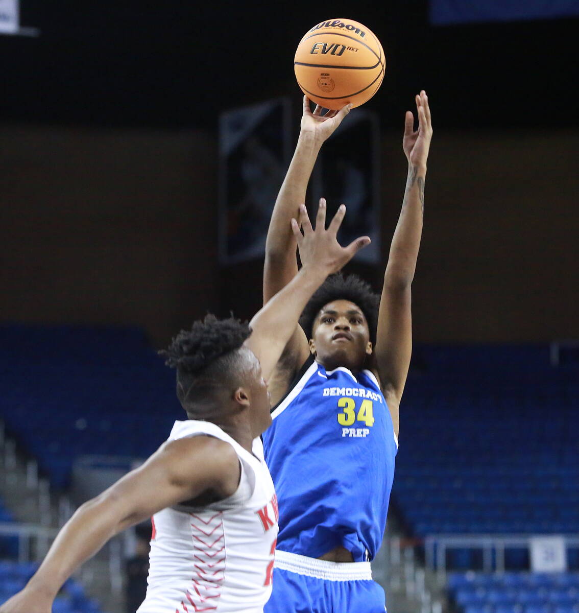 Democracy Prep freshman Dion Parker goes up for a midrange jumper during the Class 3A boys bask ...