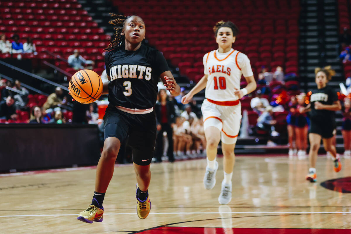 Democracy Prep point guard Bray’ana Miles (3) runs the ball to the hoop during a Class 5A gir ...