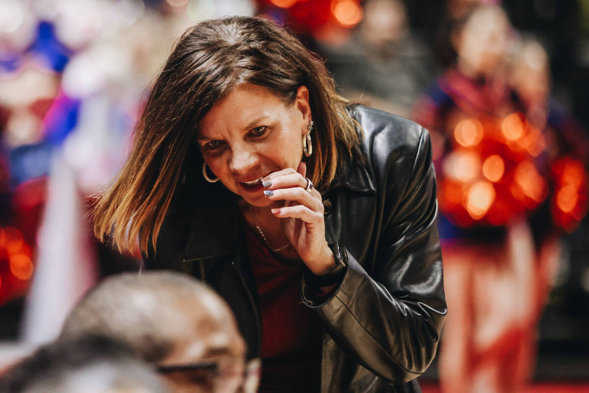 Bishop Gorman girls basketball head coach Sheryl Krmpotich speaks to an assistant during a Clas ...