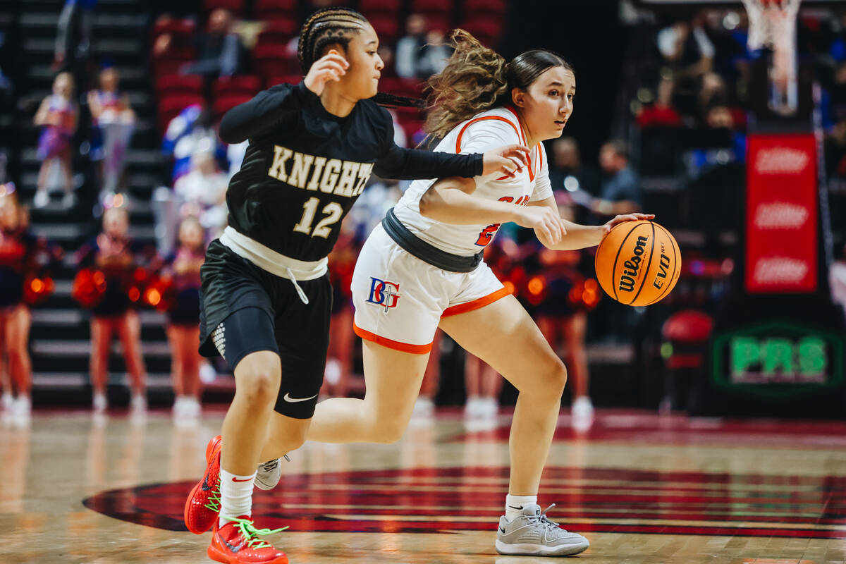 Bishop Gorman point guard Mya Ruiz (2) runs the ball down the court during a Class 5A girls bas ...