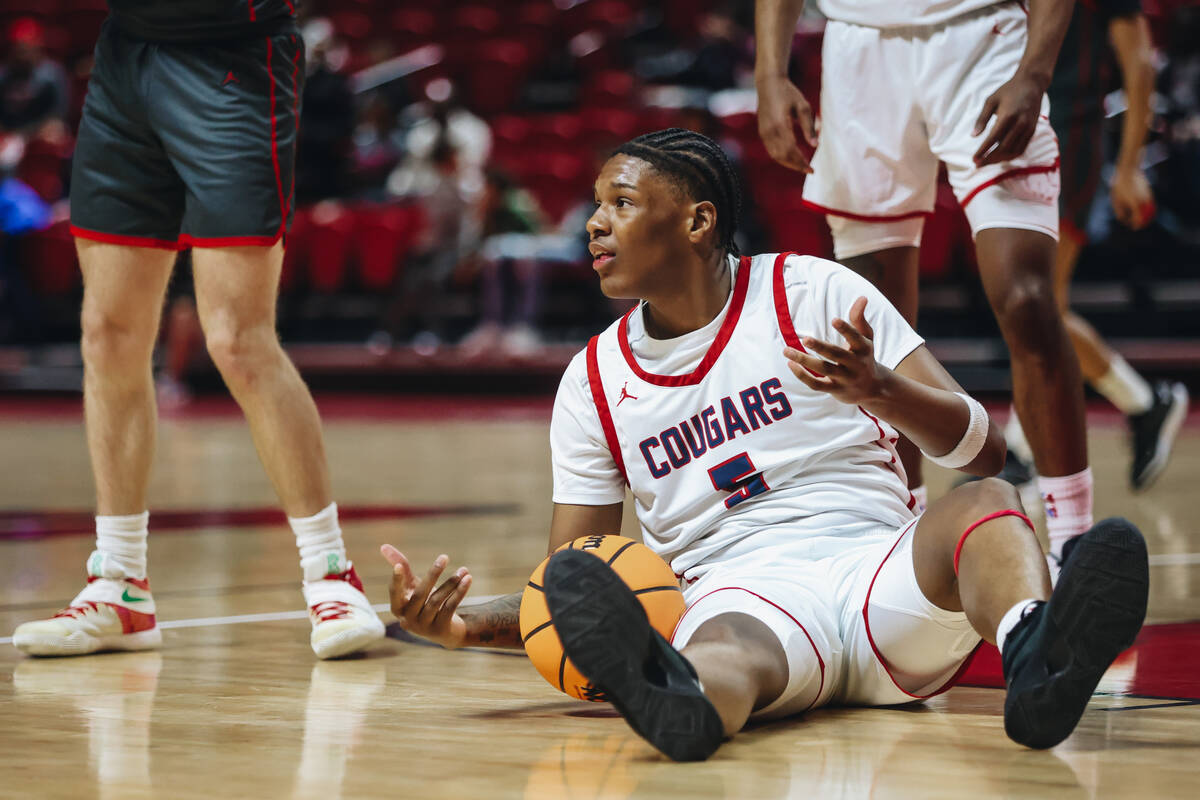 Coronado wing Lantz Stephenson (5) reacts to a call from a referee during a Class 5A boys baske ...