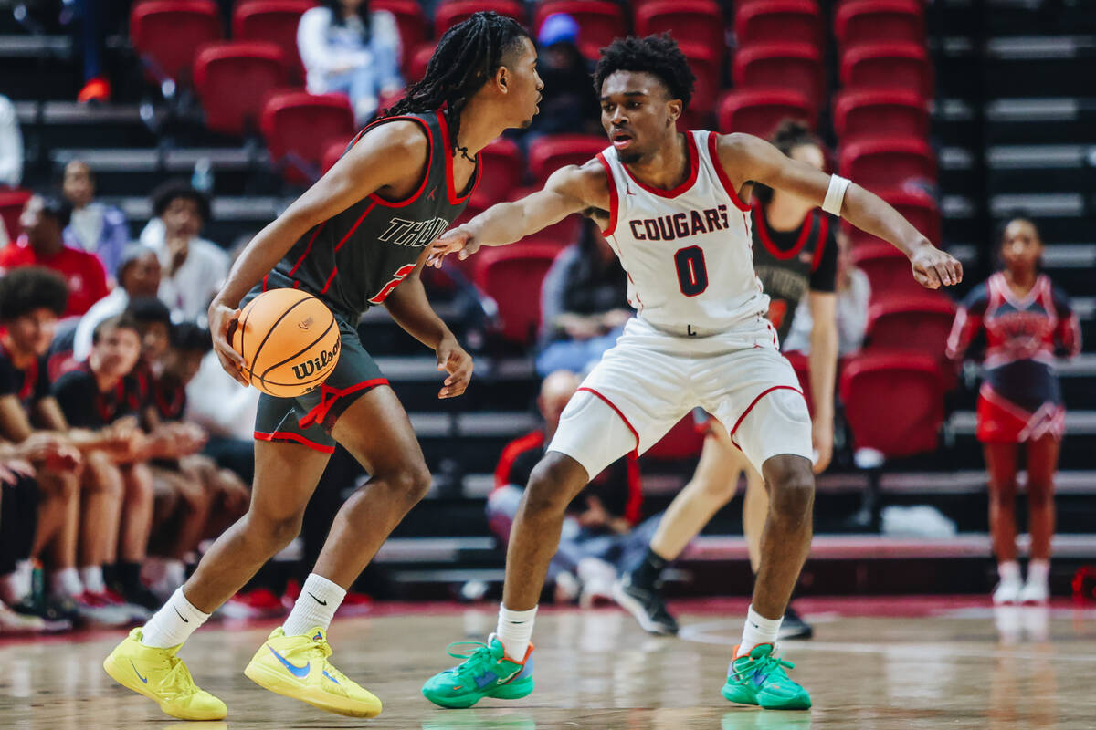 Arbor View’s Sebastian Knox (2) moves the ball during a Class 5A boys basketball state semifi ...