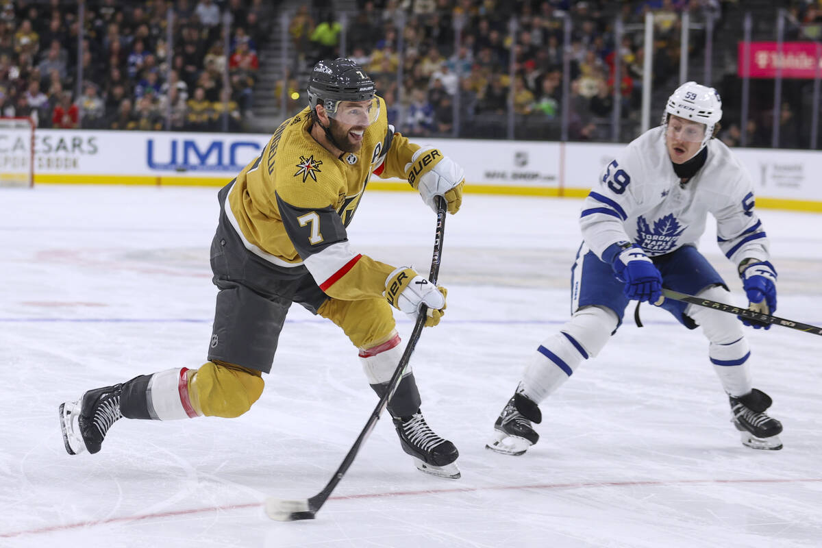 Vegas Golden Knights defenseman Alex Pietrangelo (7) shoots past Toronto Maple Leafs left wing ...