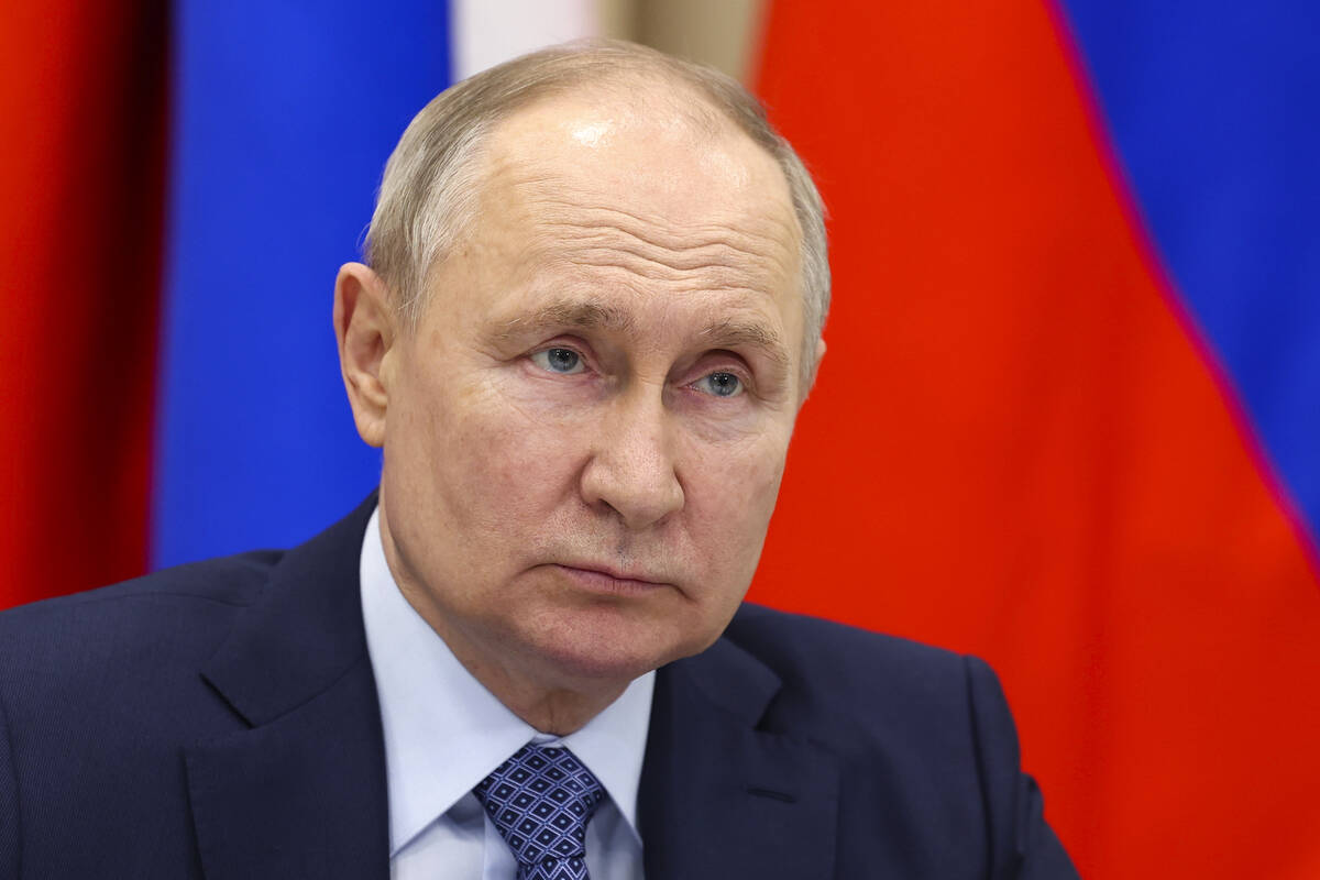 FILE - Russian President Vladimir Putin attends a meeting with officials in the town of Tsivils ...