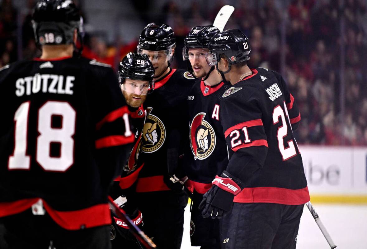 Ottawa Senators defenceman Thomas Chabot, second from right, celebrates his goal against the Ve ...