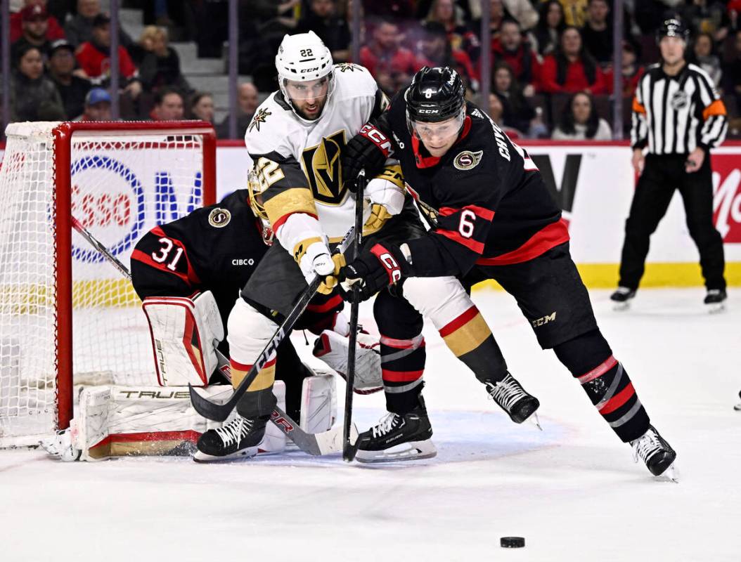 Ottawa Senators defenseman Jakob Chychrun (6) keeps Vegas Golden Knights right wing Michael Ama ...