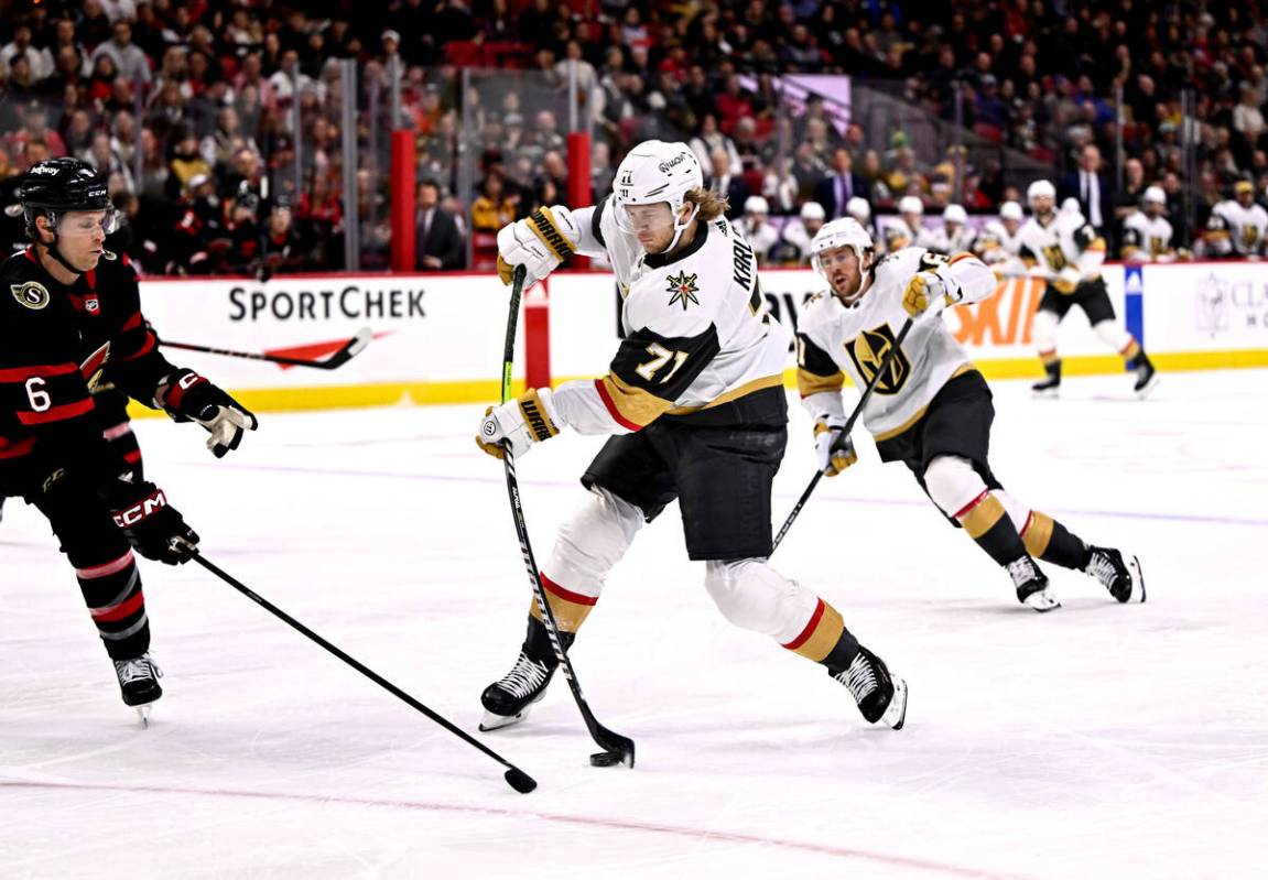 Vegas Golden Knights center William Karlsson (71) shoots as Ottawa Senators defenseman Jakob Ch ...