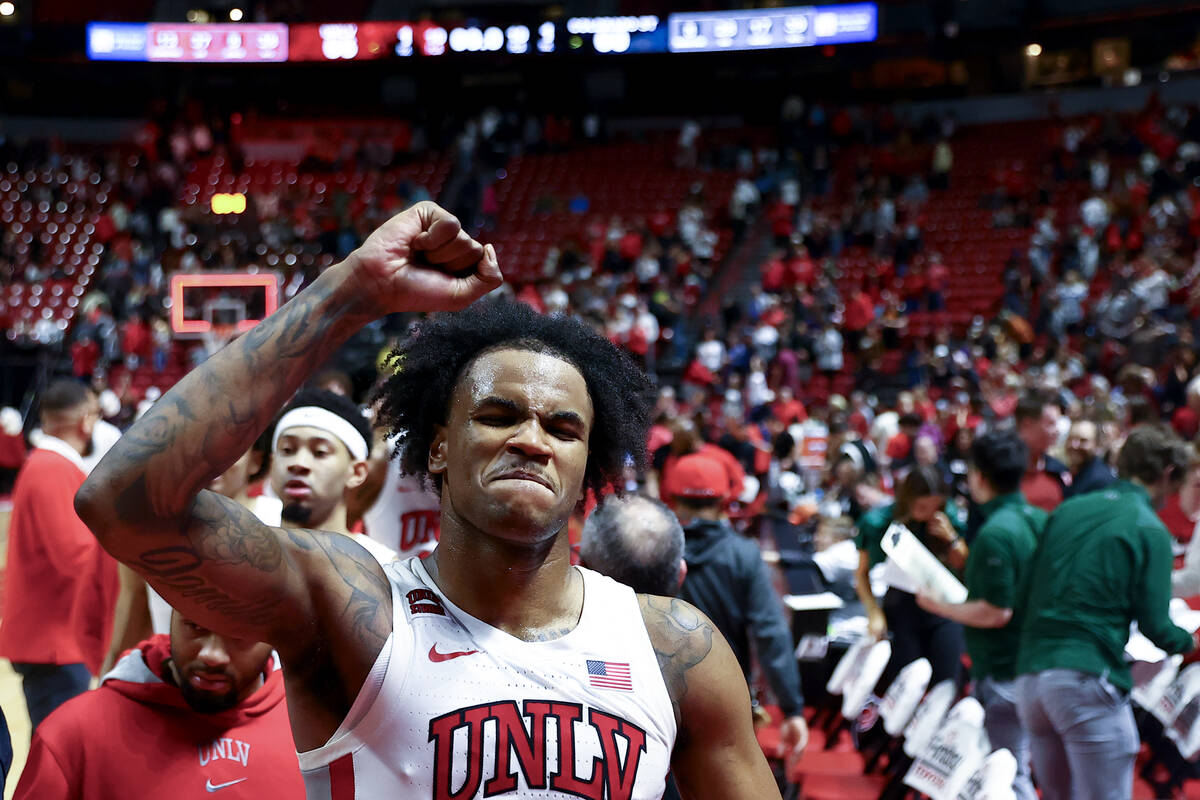 UNLV Rebels guard Luis Rodriguez (15) celebrates while leaving the court after defeating the Co ...