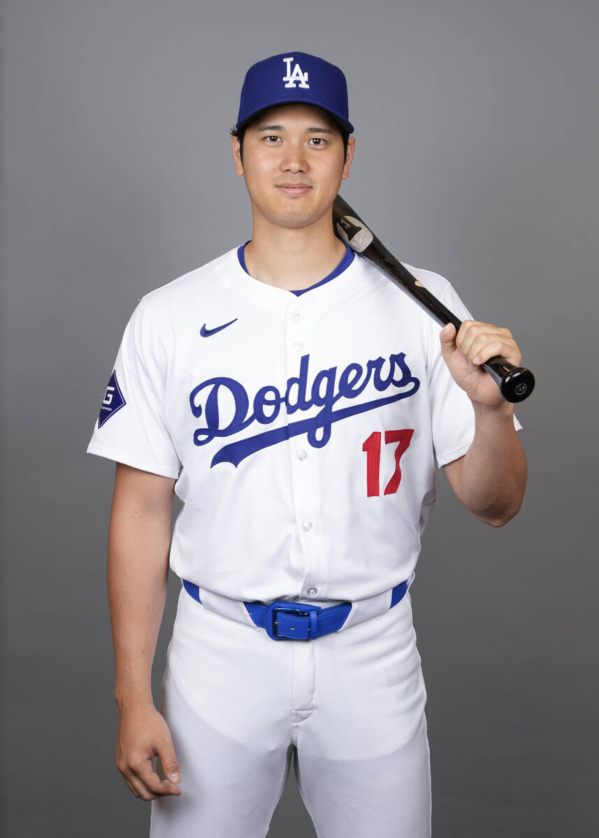 Los Angeles Dodgers designated hitter Shohei Ohtani poses for a photo during a spring training ...