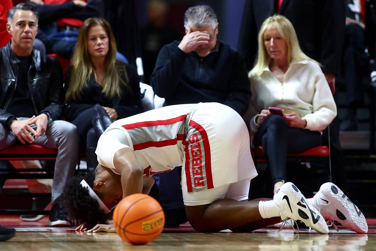 UNLV Rebels forward Rob Whaley Jr. (5) doubles over in pain during the second half of an NCAA c ...