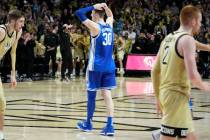 Duke's Kyle Filipowski (30) walks away after losing the ball during the second half of an NCAA ...