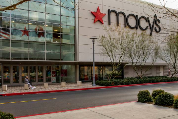 An elderly shopper sits outside of the Macy's store in Downtown Summerlin in 2020 in Las Vegas. ...