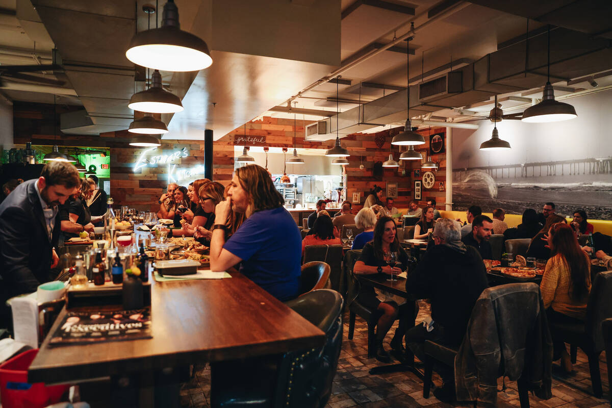 People dine at Esther’s Kitchen on the last night of service before moving to a new space, on ...