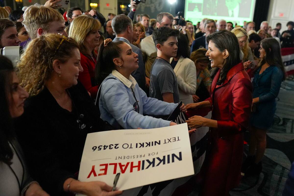 Republican presidential candidate former UN Ambassador Nikki Haley, right, greeting supporters ...