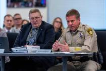 Sheriff Kevin McMahill, right, speaks as Chief Financial Officer Richard Hoggan listens in duri ...