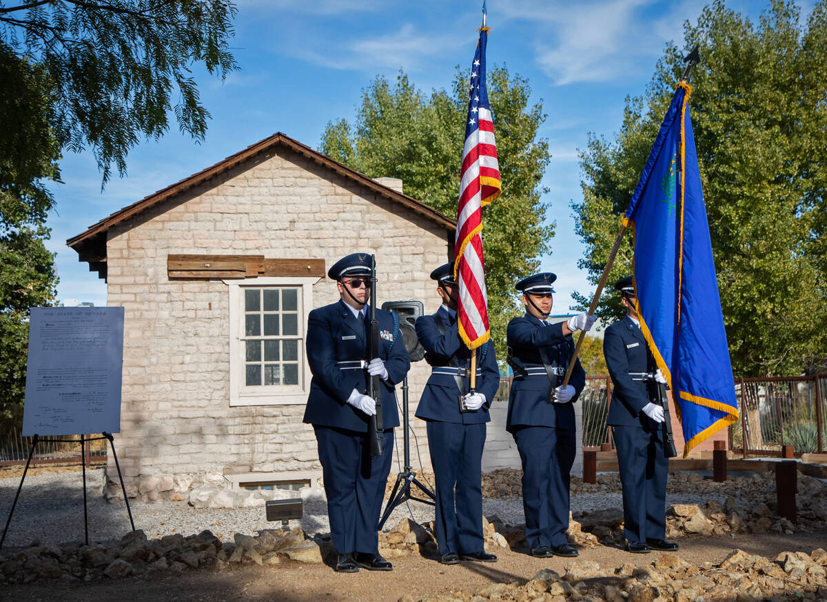 Members of Rancho High school Airfare Junior ROTC hold flags during a ceremony in honor of the ...