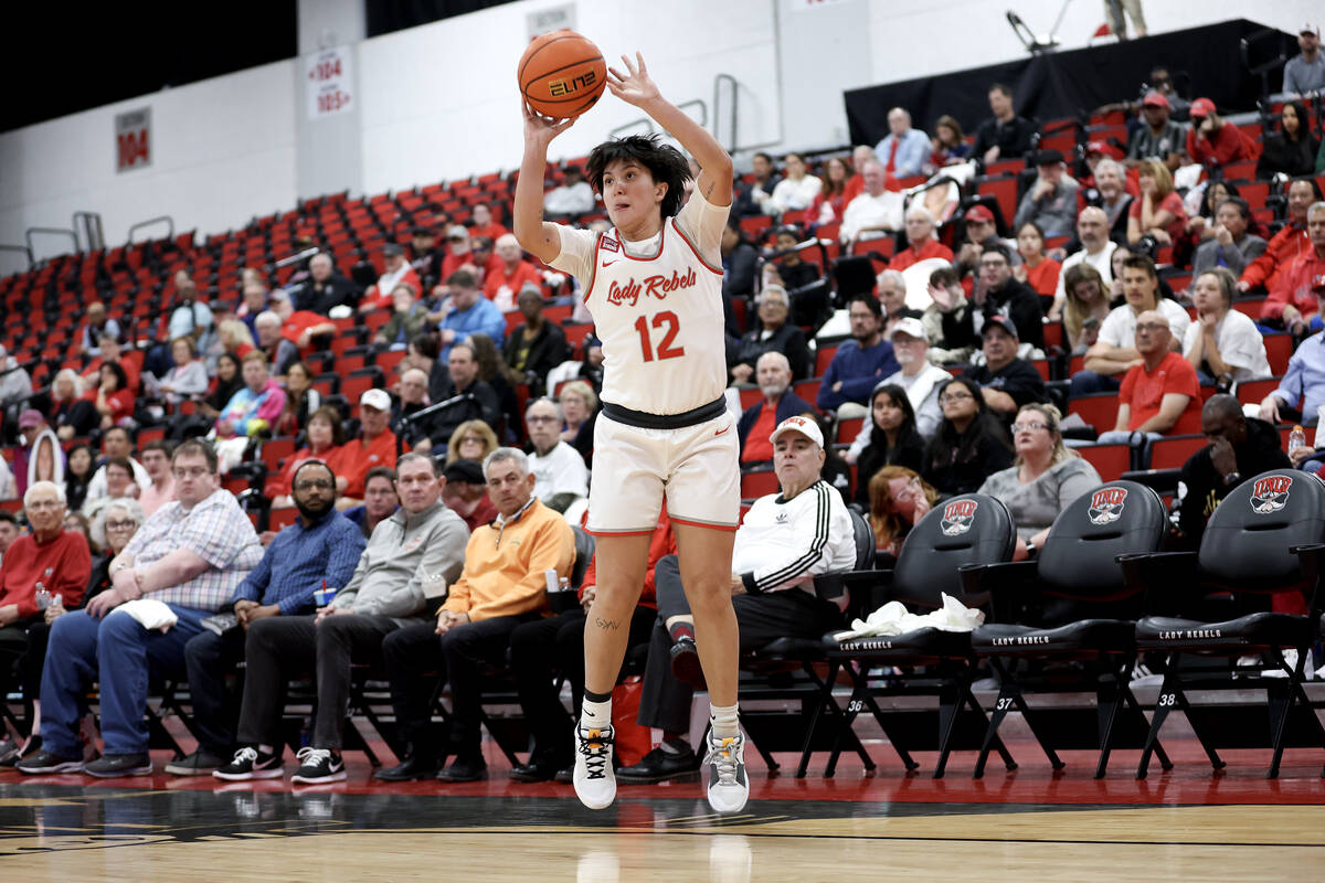 UNLV Lady Rebels guard Alyssa Durazo-Frescas (12) shoots a three-pointer during the first half ...