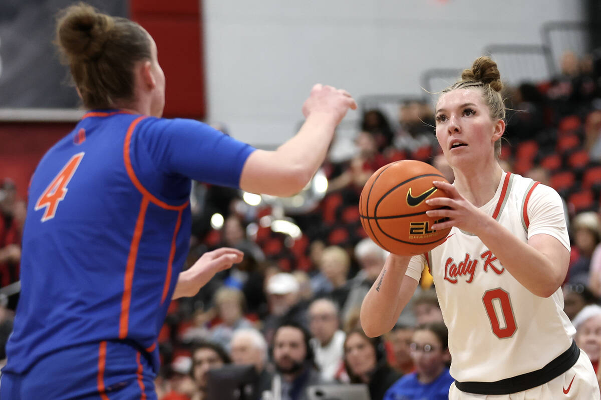 UNLV Lady Rebels guard Ashley Scoggin (0) shoots against Boise State Broncos guard Dani Bayes ( ...