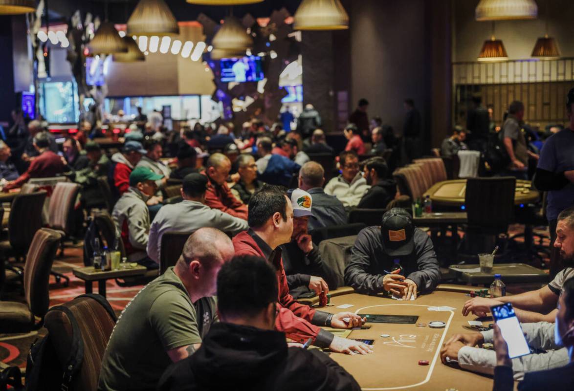 Guests play poker at the Aria hotel-casino in Las Vegas, Wednesday, Jan. 31, 2024. (Rachel Asto ...