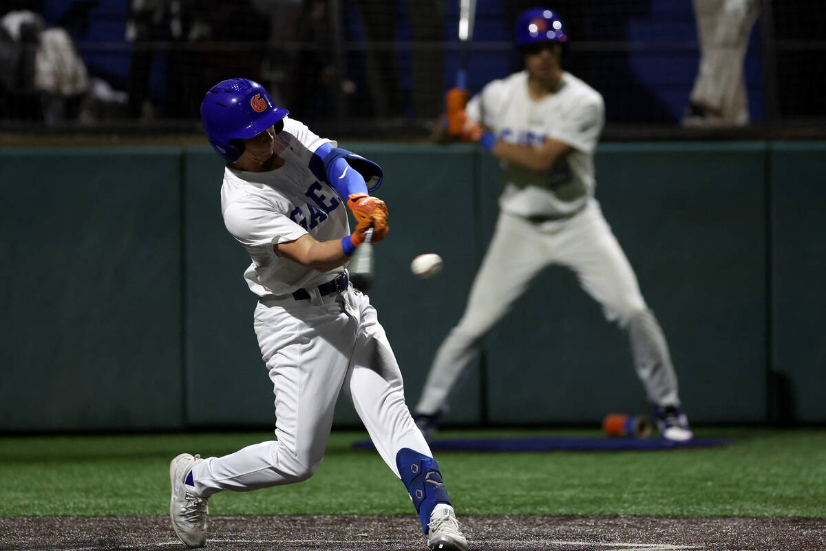 Bishop Gorman outfielder Tanner Teffs bats against Basic during a high school baseball game at ...