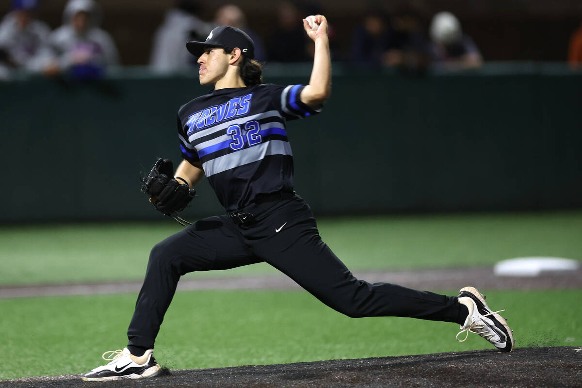 Basic pitcher Sebastian Montoya throws to Bishop Gorman during a high school baseball game at B ...